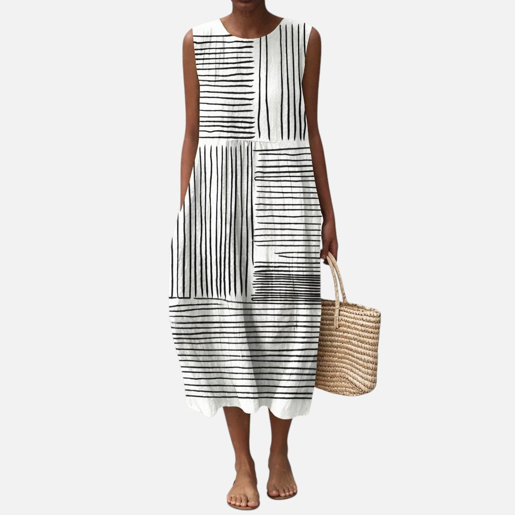Anouk | Mouwloze midi-jurk met zwart-witte streepvlakken