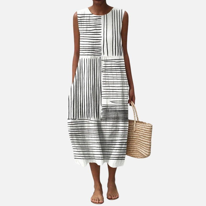Anouk | Mouwloze midi-jurk met zwart-witte streepvlakken
