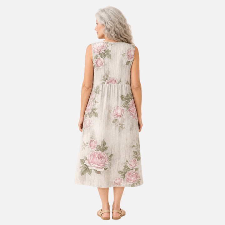 Noor | Mouwloze midi-jurk met oudroze rozen op crème