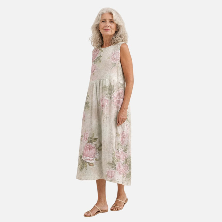 Noor | Mouwloze midi-jurk met oudroze rozen op crème