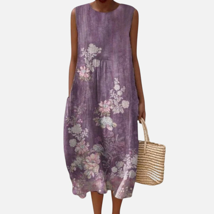 Sophie | Mouwloze midi-jurk met bloemen op paars